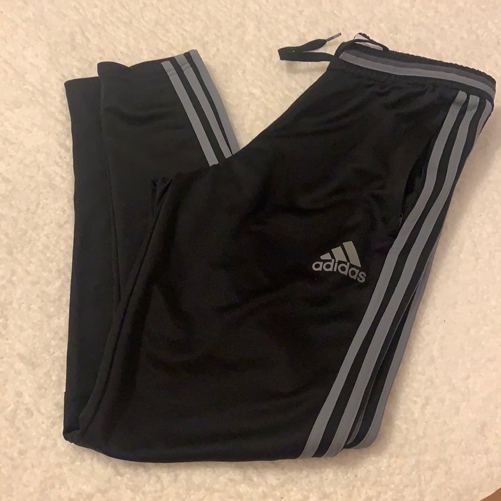 Black and grey adidas joggers